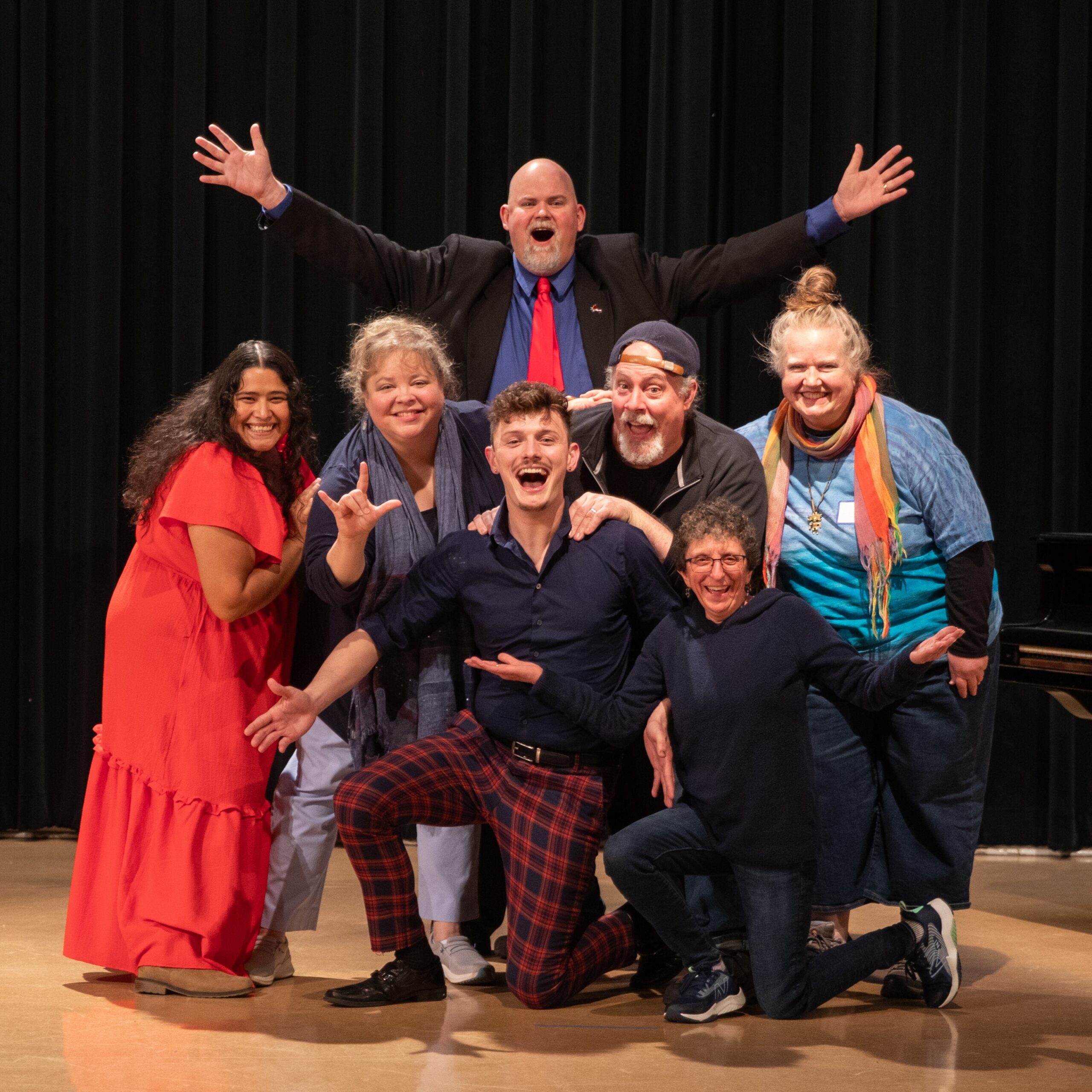 Photograph of seven individuals on a stage from an Ex Fabula Deaf StorySlam