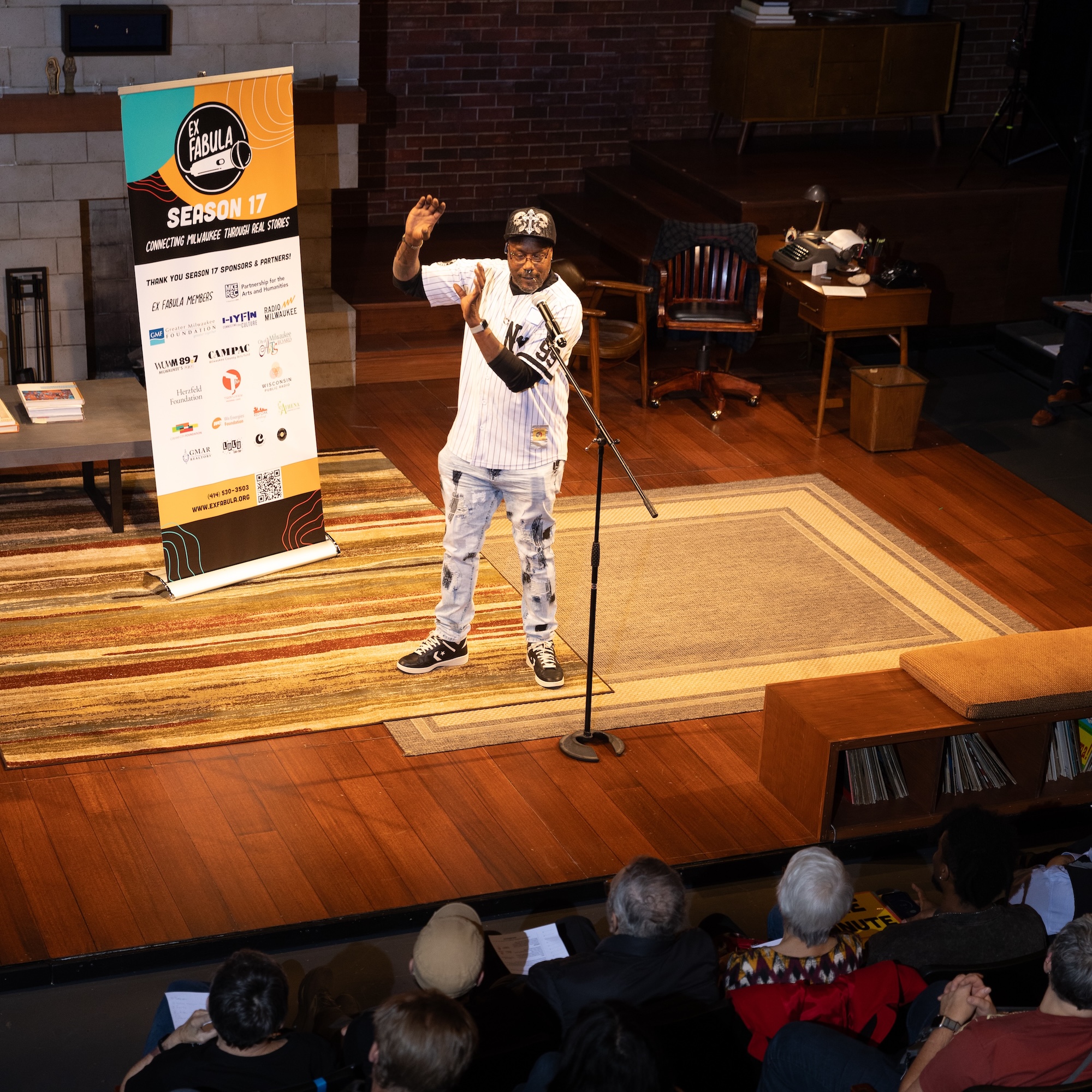 Photo of a storyteller on stage at an Ex Fabula StorySlam