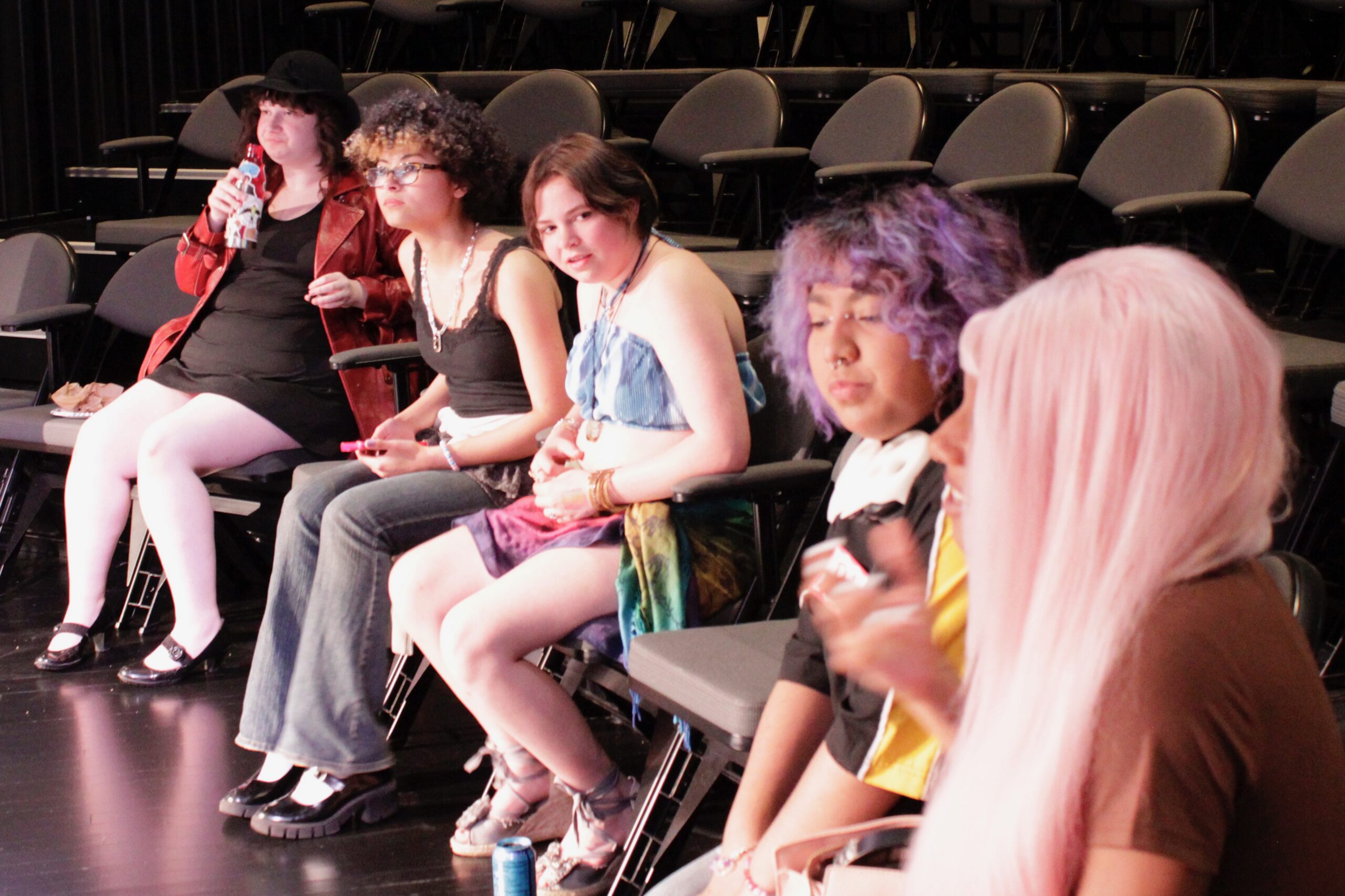 "Celebrating Queer Pride & Joy" - Photo of teen storytellers at the 2026 Pride Week Teen StorySlam, held at First Stage Theater.