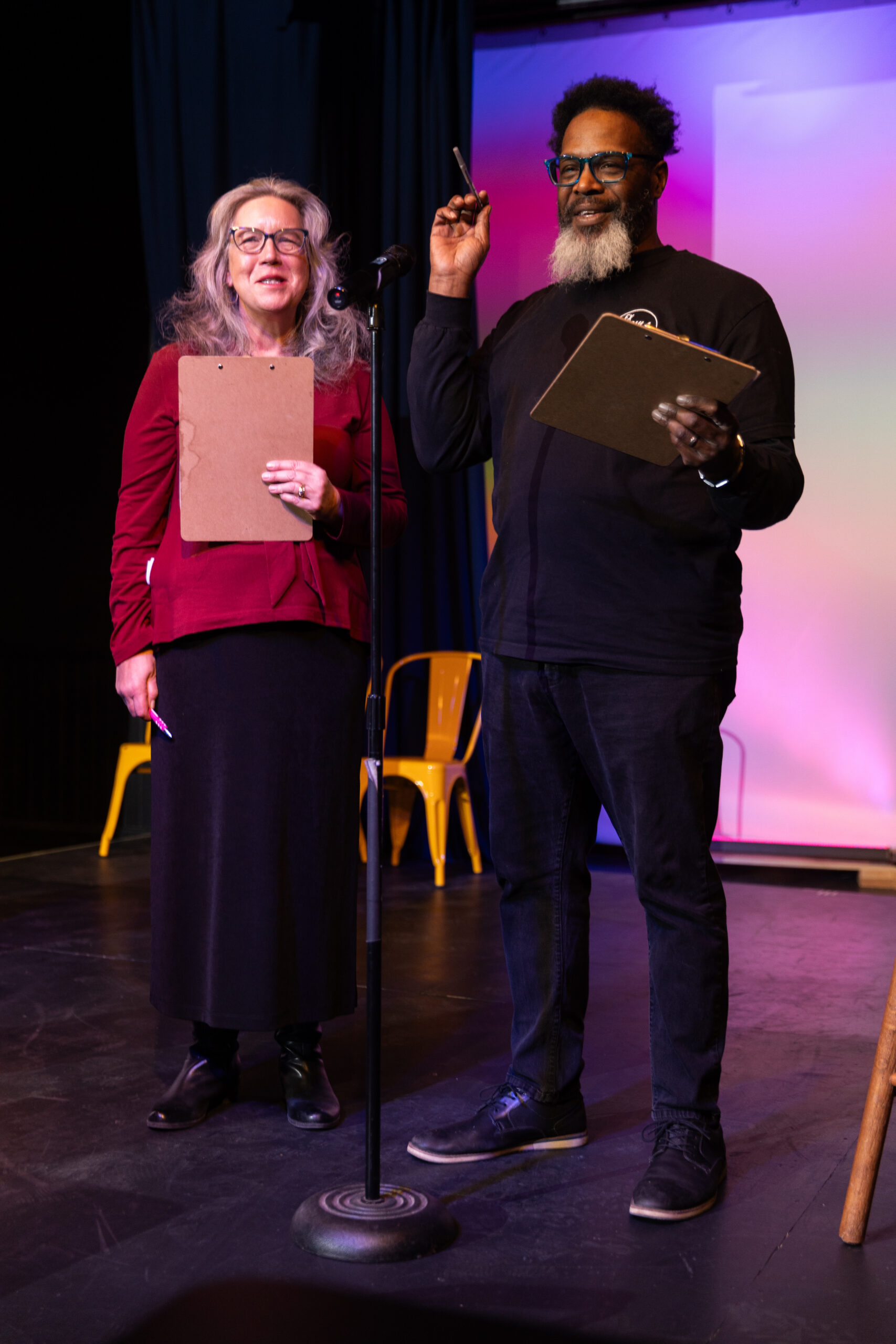 Elaine-and-Shawn-2025 Photo of storytelling coaches Elaine Maly and Shawn Mitchell at an Ex Fabula event in 2025.